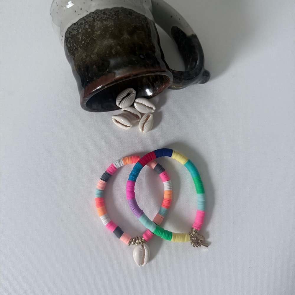 Beach bum-
Colorful clay heishi bead bracelets